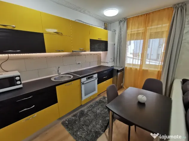 INCHIRIEZ Apartament 2cam bloc NOU,cu design modern,format din dormitor intim zonă de living open space(aprox 50mp)