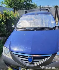 Dacia Logan ținută în garaj