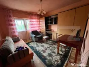 Garsonieră practică, mobilată și bine compartimentată 