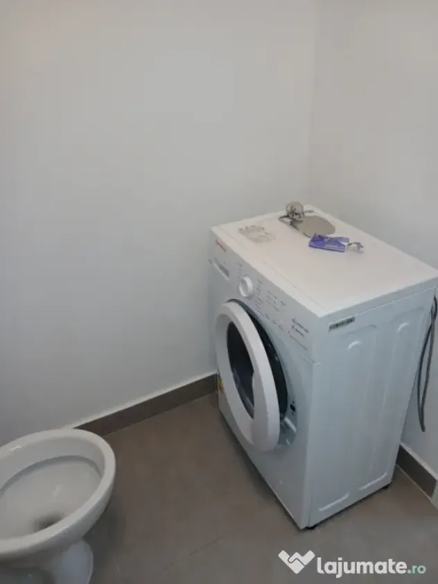ofer spre închiriere apartament cu doua camere ( tip Studio)