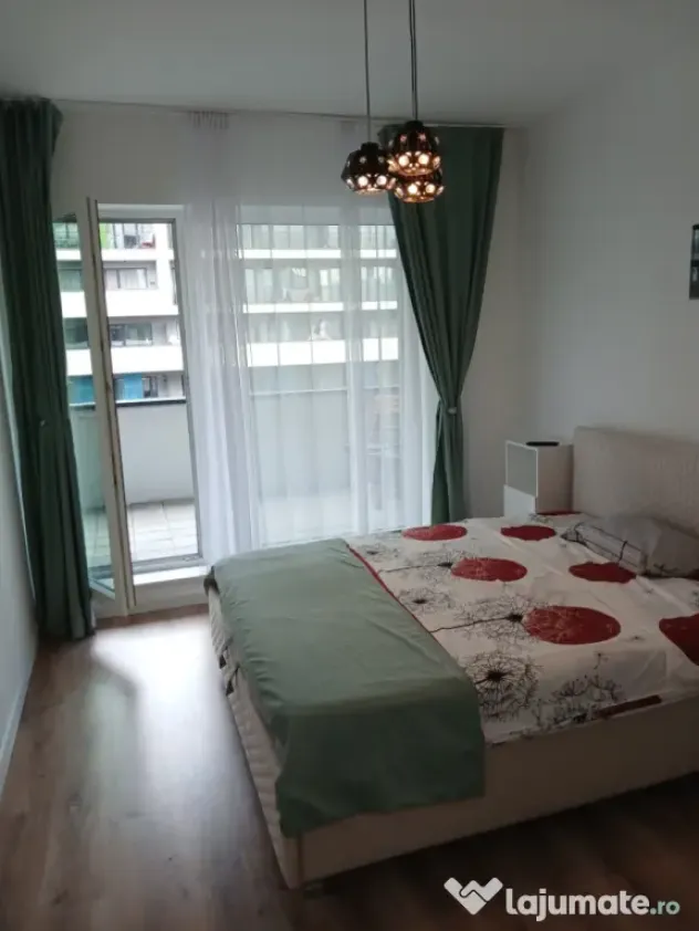 ofer spre închiriere apartament cu doua camere ( tip Studio)