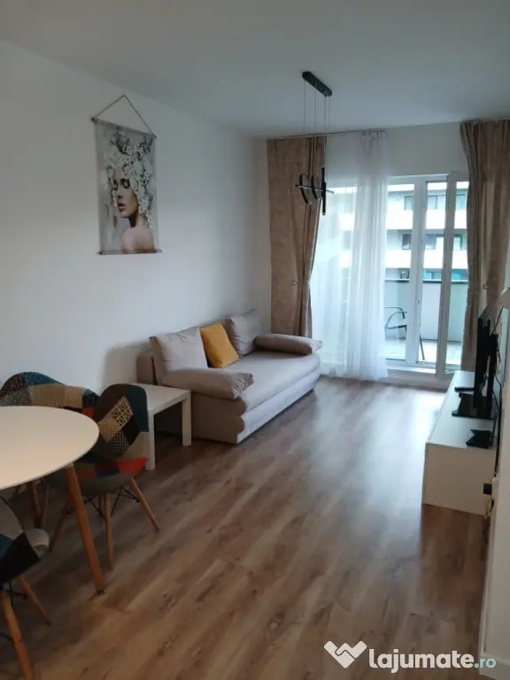 ofer spre închiriere apartament cu doua camere ( tip Studio)