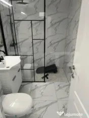 APARTAMENT CU 2 CAMERE SITUAT INTR-O ZONA CU MULTE FACILITAT 
