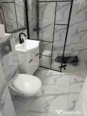 APARTAMENT CU 2 CAMERE SITUAT INTR-O ZONA CU MULTE FACILITAT 