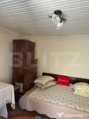 Vand casa cu garaj si teren + anexe