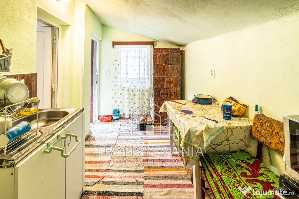 Casă renovată cu teren de 1.425 mp de vânzare în Năsal, com. Țaga