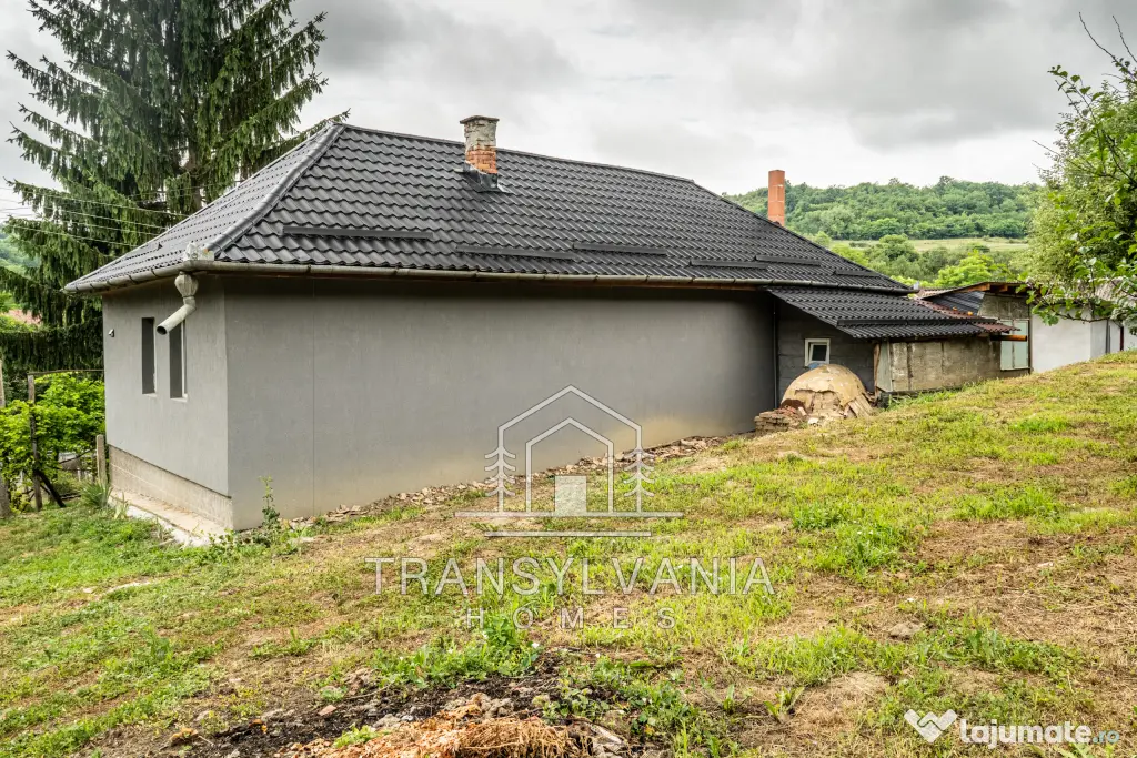 Casă renovată cu teren de 1.425 mp de vânzare în Năsal, com. Țaga