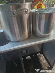 Are două oale de inox 50kg este in stare buna
