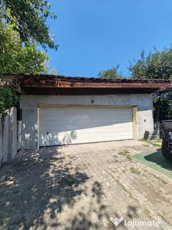 Casă individuală 170 mp, curte 683 mp, 2 garaje cu ușă a