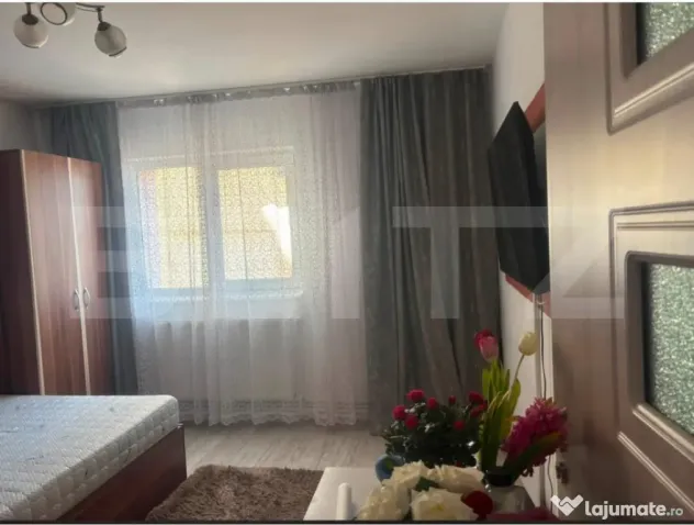 Apartament cu 2 camere, decomandat, etaj intermediar, zona B