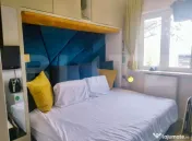 Garsoniera renovata, vedere panoramică spre stadion / aface 
