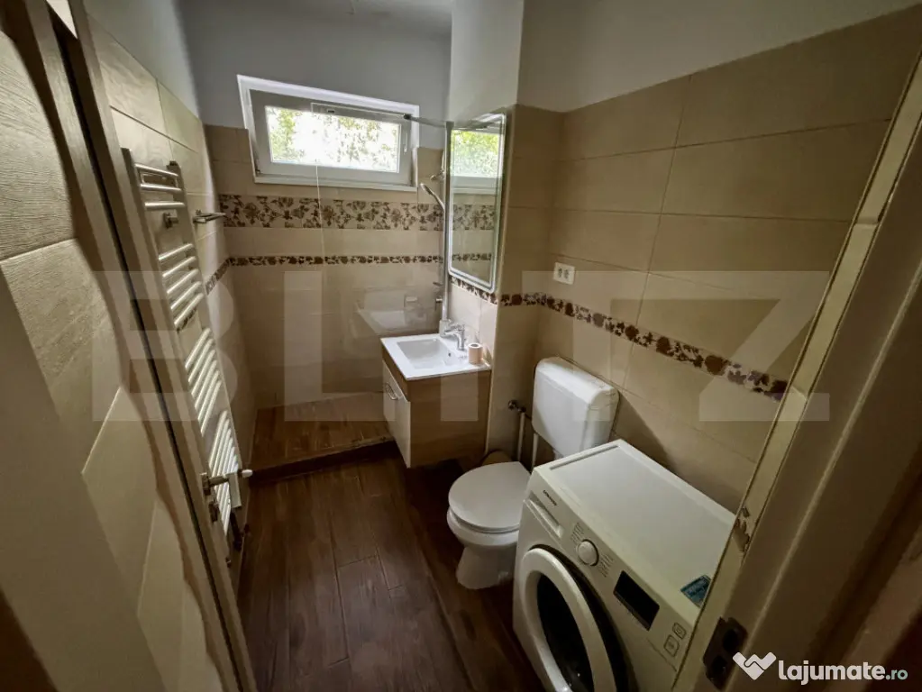Apartament spațios cu 4 camere, 3 dormitoare și parcar