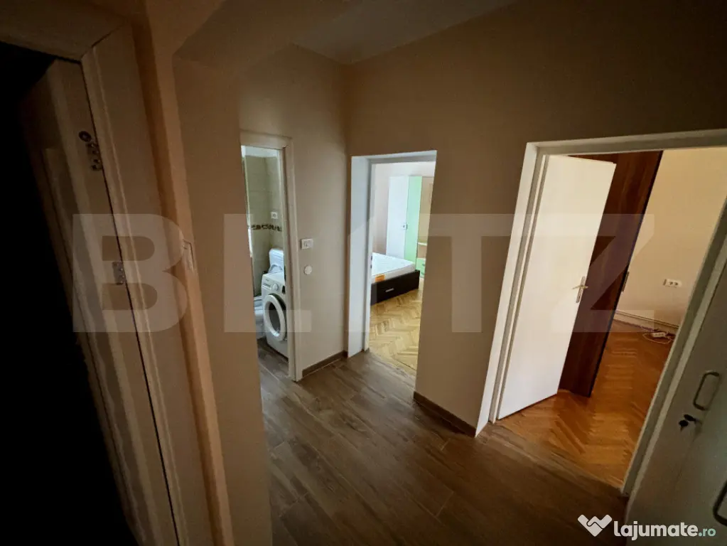 Apartament spațios cu 4 camere, 3 dormitoare și parcar