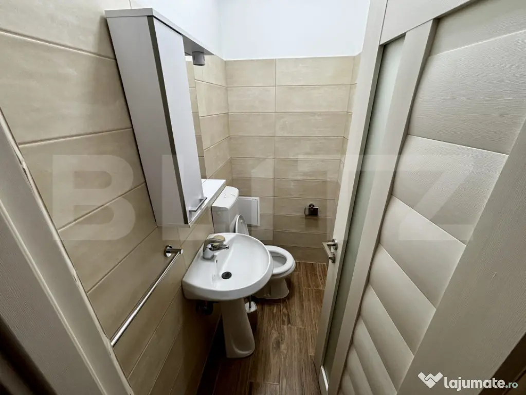 Apartament spațios cu 4 camere, 3 dormitoare și parcar