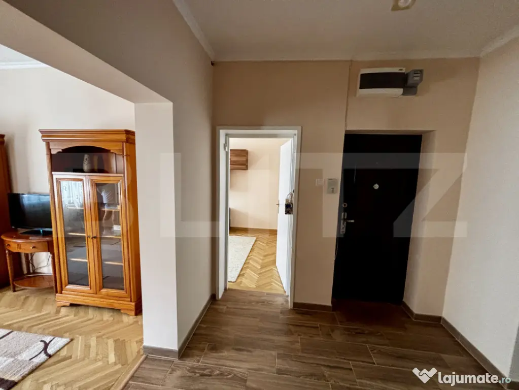 Apartament spațios cu 4 camere, 3 dormitoare și parcar