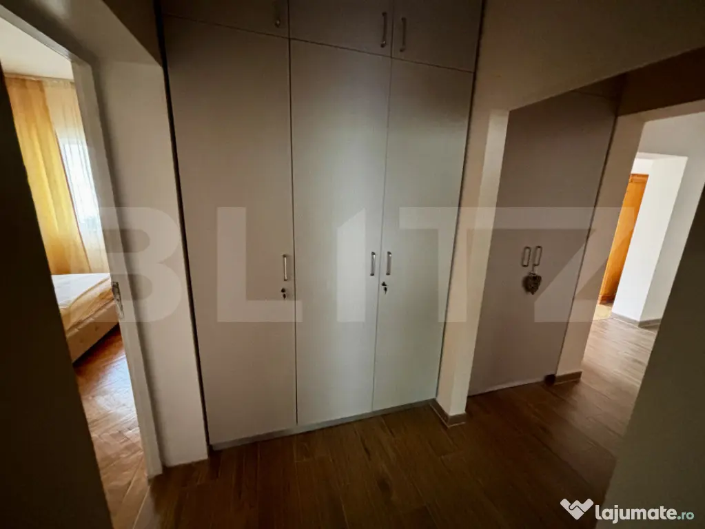 Apartament spațios cu 4 camere, 3 dormitoare și parcar
