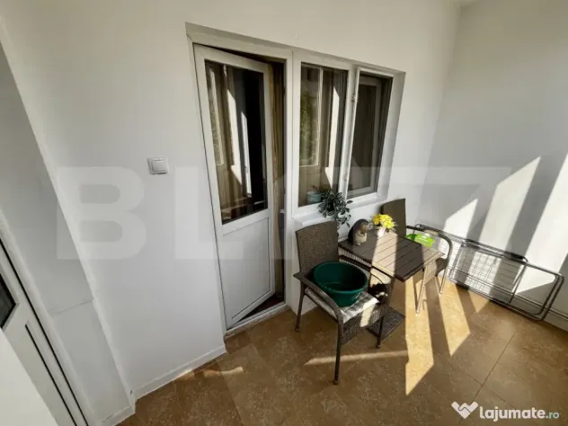 Apartament spațios cu 4 camere, 3 dormitoare și parcar