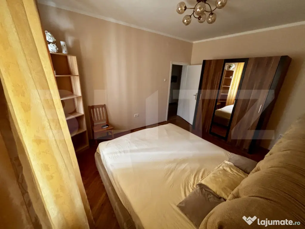 Apartament spațios cu 4 camere, 3 dormitoare și parcar