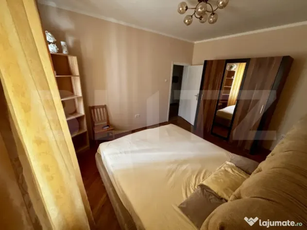 Apartament spațios cu 4 camere, 3 dormitoare și parcar