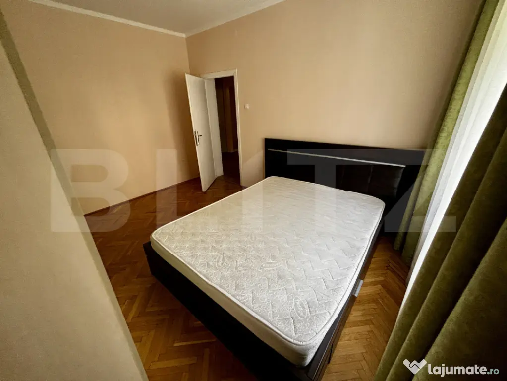 Apartament spațios cu 4 camere, 3 dormitoare și parcar