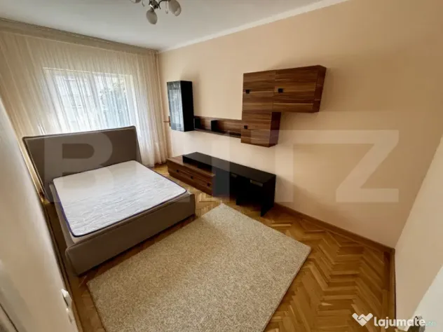 Apartament spațios cu 4 camere, 3 dormitoare și parcar