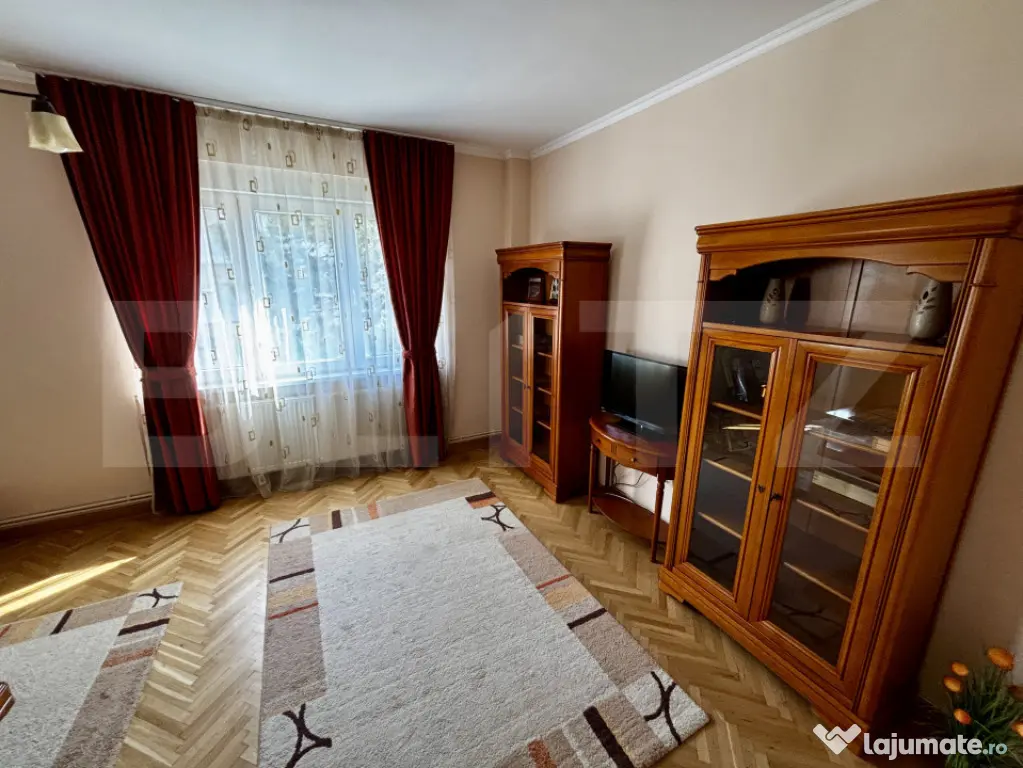 Apartament spațios cu 4 camere, 3 dormitoare și parcar