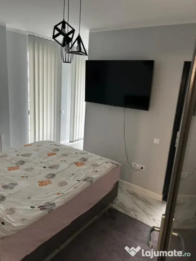 Apartament de vanzare semidecomandat ,2 camere 55mp , zona E - Floresti (Cluj)