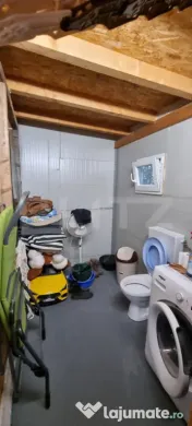 Casa cu 2 corpuri si anexe 