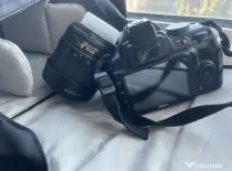 Vând Aparat foto DSLR Model Nikon D3000 + obiectiv Nikon AF-S DX