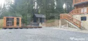 Cabana din bustean masiv si o suprafata de teren de 9000 mp