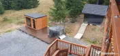 Cabana din bustean masiv si o suprafata de teren de 9000 mp