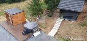 Cabana din bustean masiv si o suprafata de teren de 9000 mp