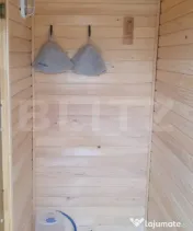 Cabana din bustean masiv si o suprafata de teren de 9000 mp