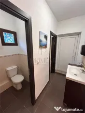 Casa de locuit cu spatiu comercial la parter si spalatorie a 