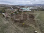 Teren intravilan 900 m², Dezmir, front 15 m, vedere spre Cl 