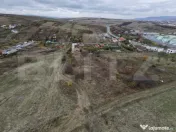 Teren intravilan 900 m², Dezmir, front 15 m, vedere spre Cl 