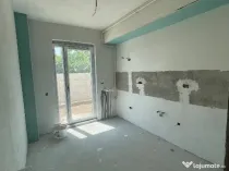 Apartament cu 2 camere decomandat + curte cadastrată