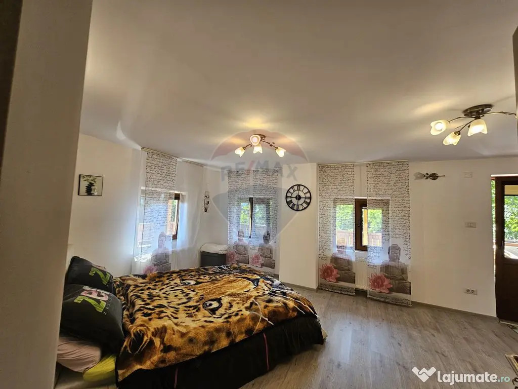 Casă solidă din cărămidă, mobilată, garaj, teren ge...