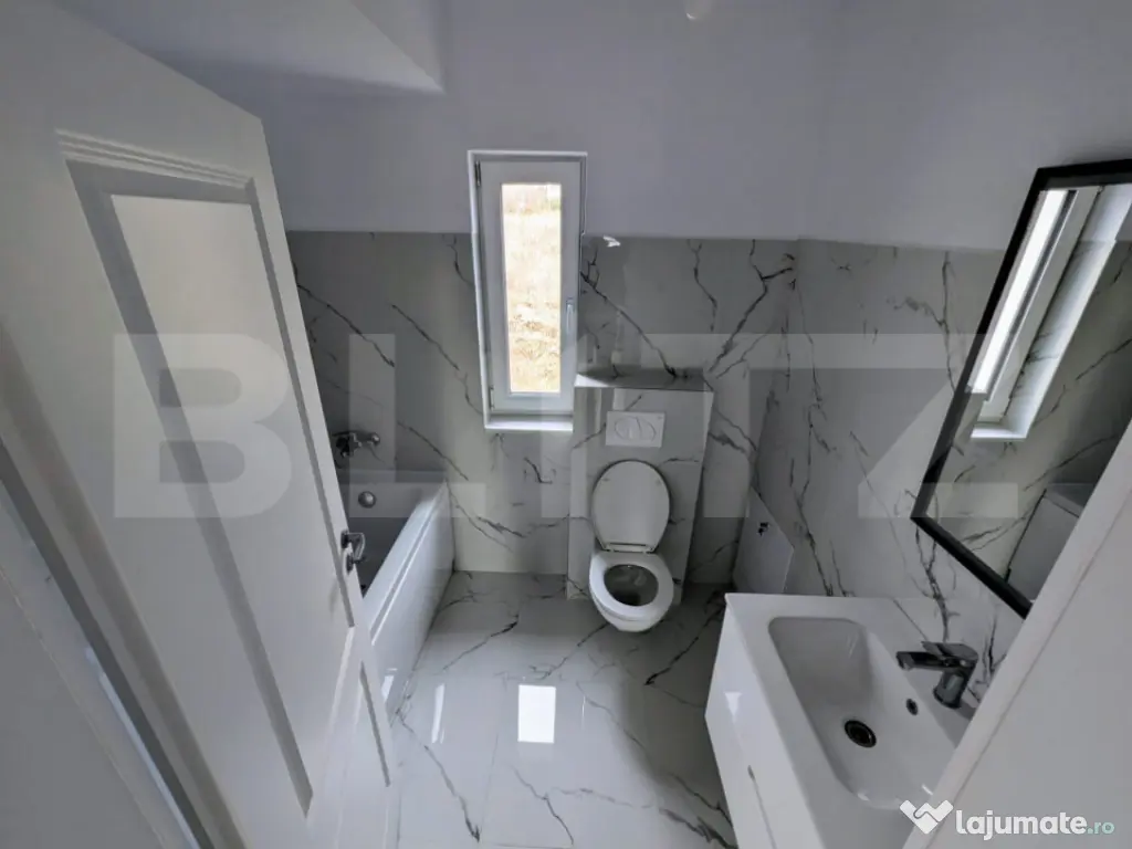 Proprietate deosebită cu design modern și finisaje premium