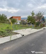 Teren intravilan generos cu utilitati si front larg in Jucu