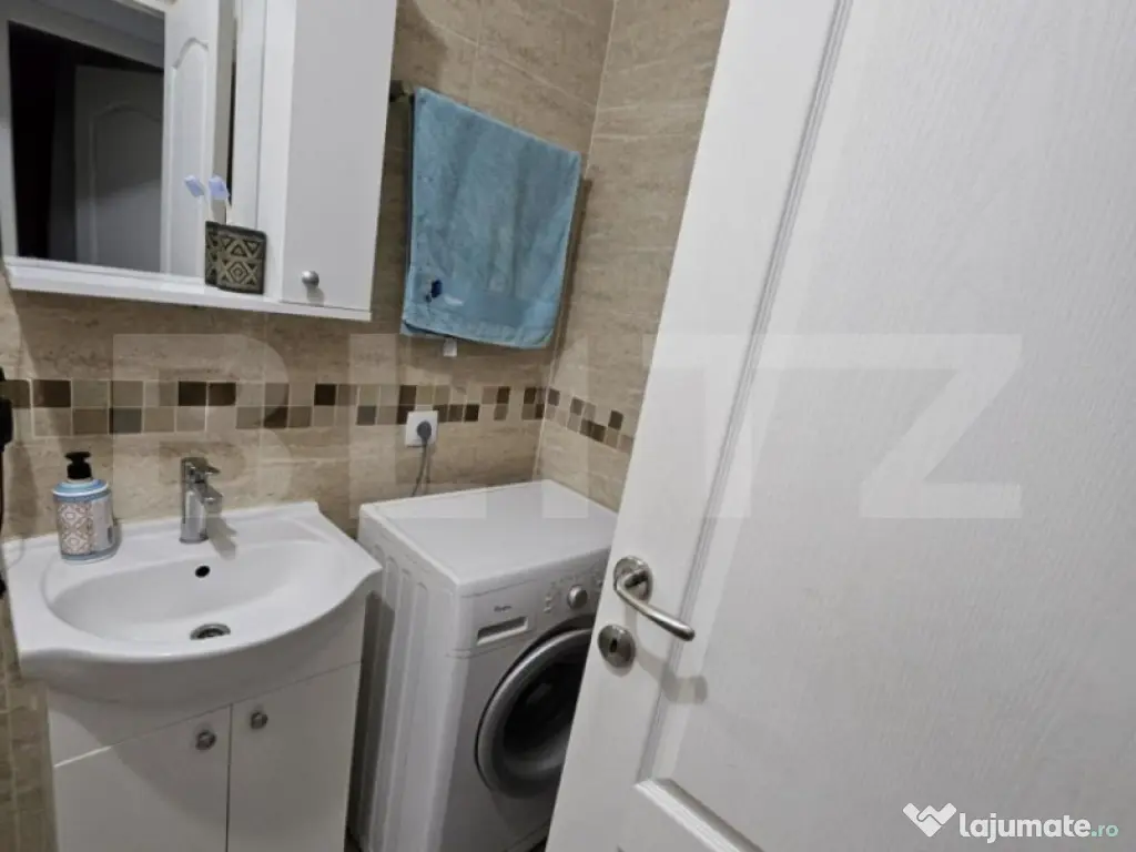 Apartament cu 2 camere + loc de parcare