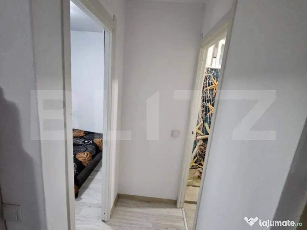 Apartament cu 2 camere + loc de parcare
