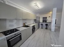 Apartament modern, dressing, birou, parcare subterană – F