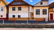 Casă cu potențial în Schei – cu front la două străzi