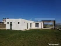 Casa individuala Osorhei cu filigorie si gard imprejmuire