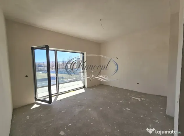 Locuinta moderna cu design cubic si curte plana in Dezmir