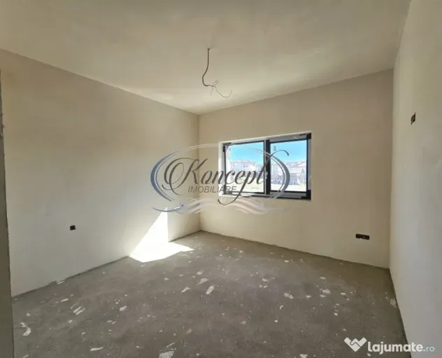 Locuinta moderna cu design cubic si curte plana in Dezmir
