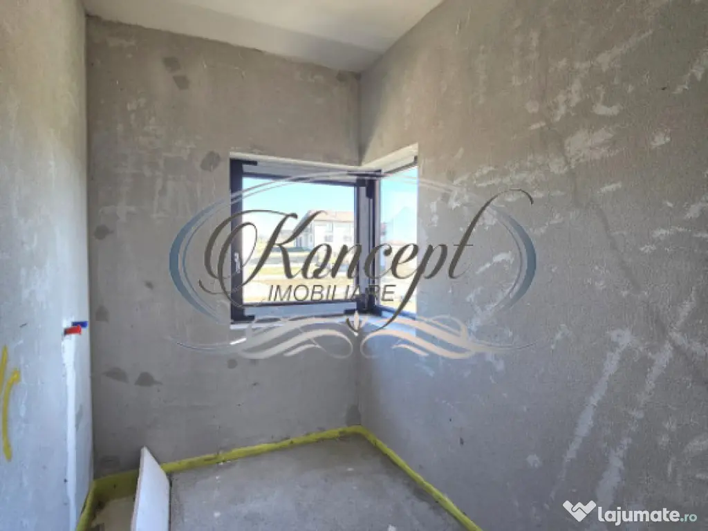 Locuinta moderna cu design cubic si curte plana in Dezmir