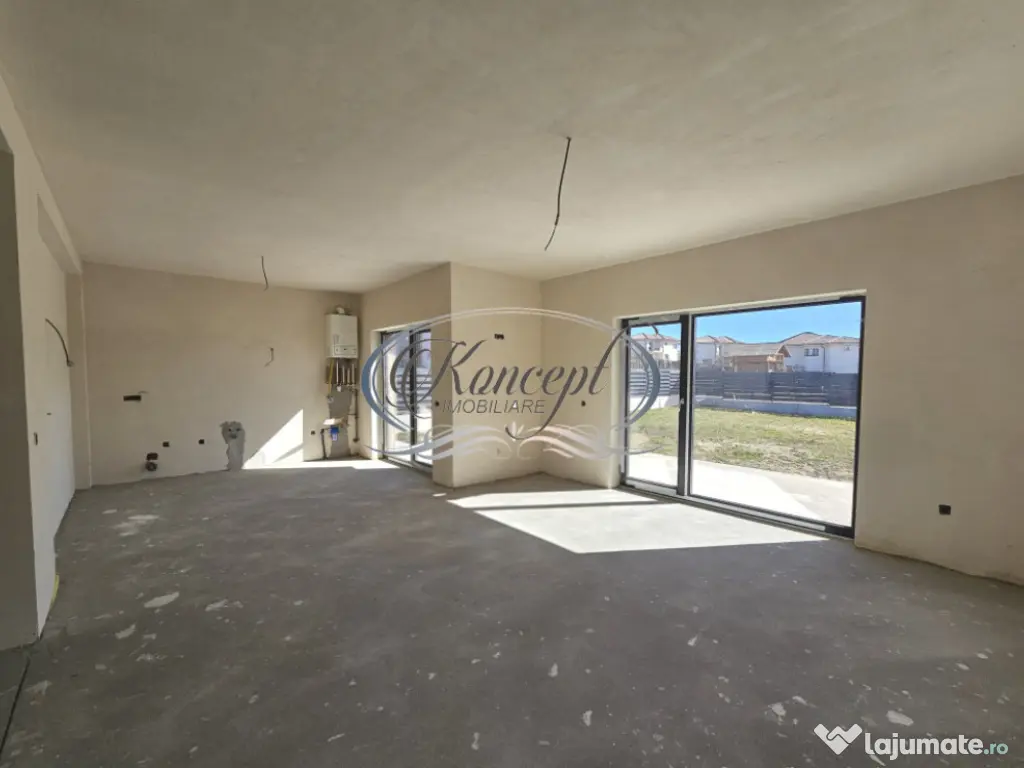 Locuinta moderna cu design cubic si curte plana in Dezmir