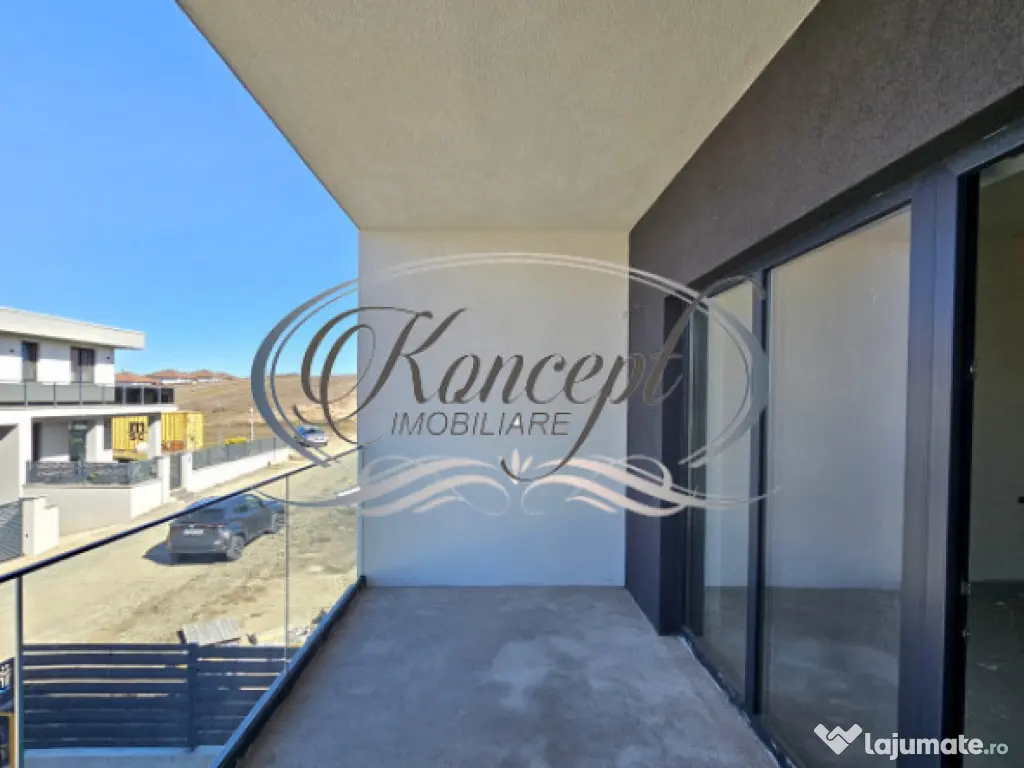 Locuinta moderna cu design cubic si curte plana in Dezmir